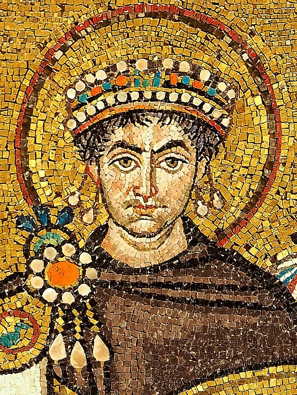 Emperor Justinian: Justinian I, whose general Belisarius reconquered Africa for Byzantium in 533–534 CE (mosaic, San Vitale, Ravenna).
